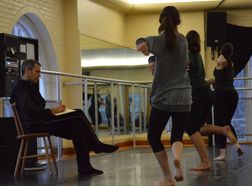 instructor teaching dance students